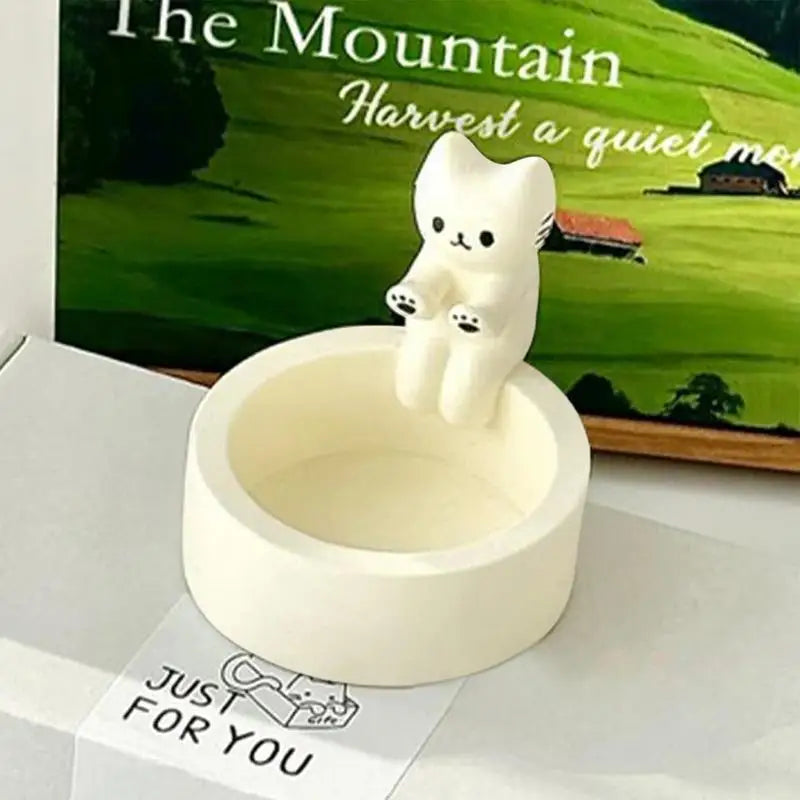 Kitten Candle Holder Warming Its Paws